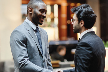 Two professionals shaking hands